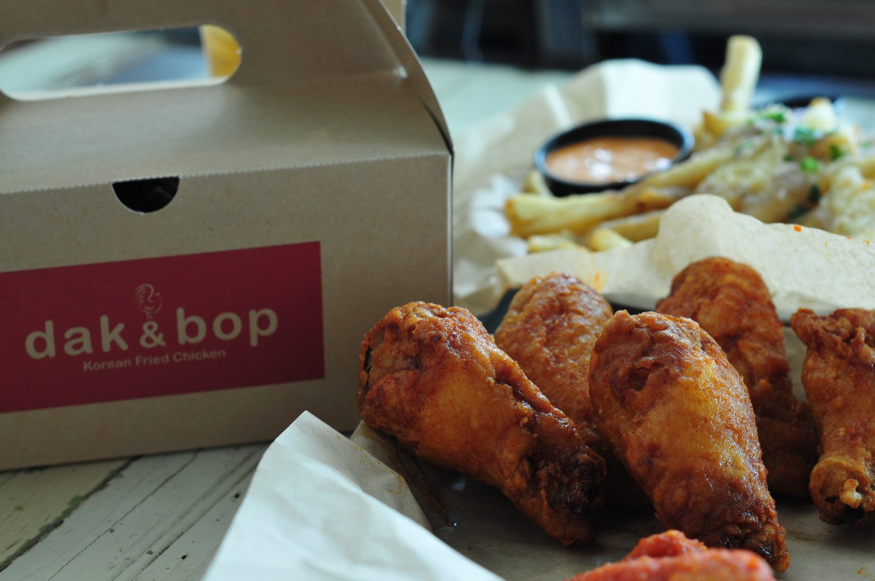 Dak & Bop Korean fried chicken wings and fries to go