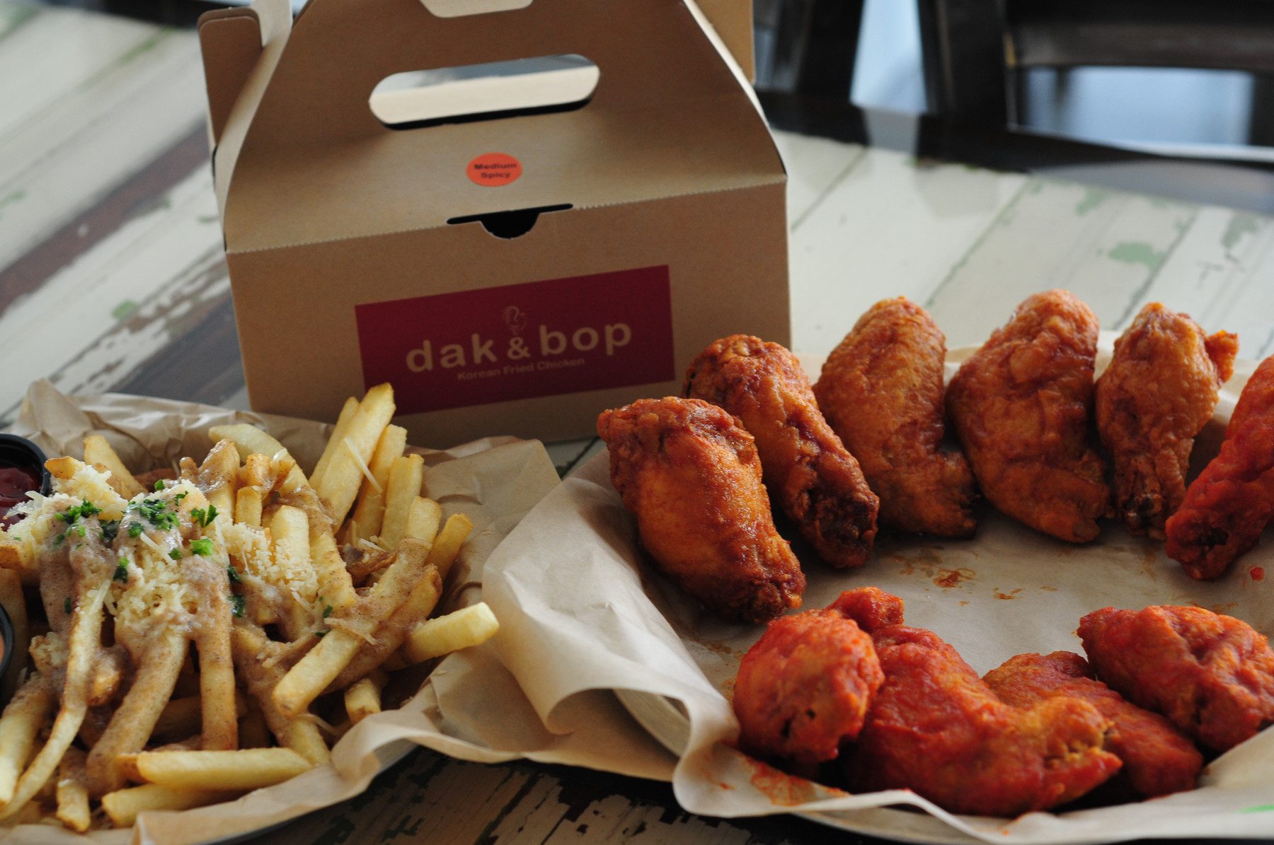Korean fried chicken in a Dak & Bop to-go box